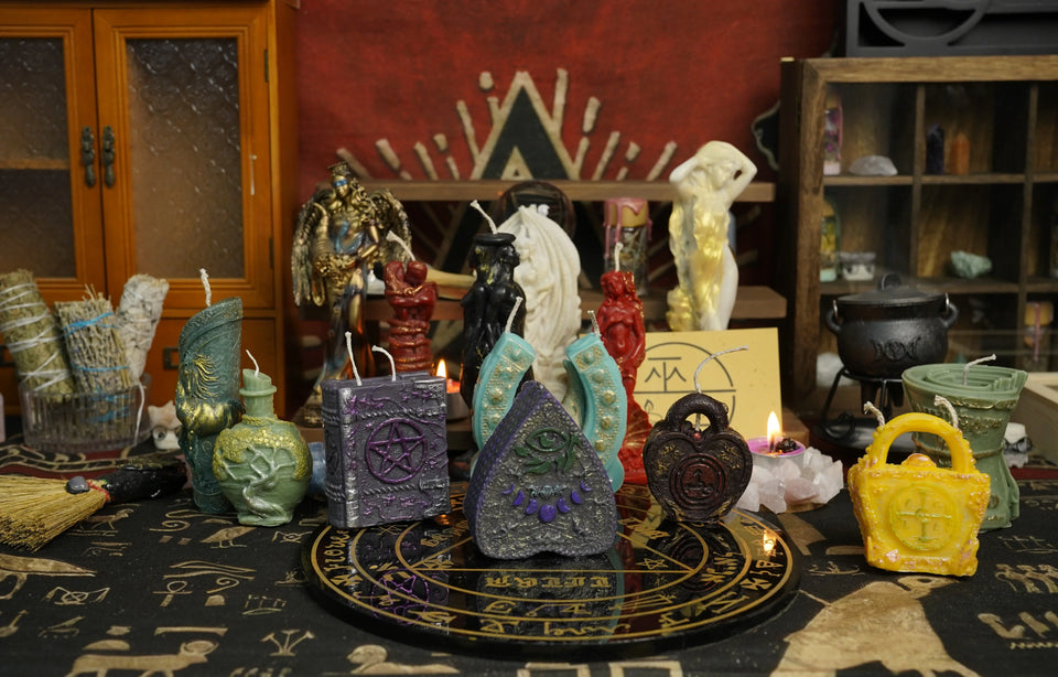 Wuwualice ritual candles, magical oils and Solomon seals arranged on a mystical altar
