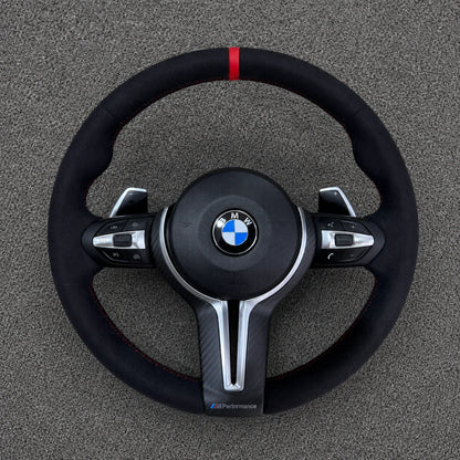 BMW 2 Series black and white carbon fiber steering wheel detail